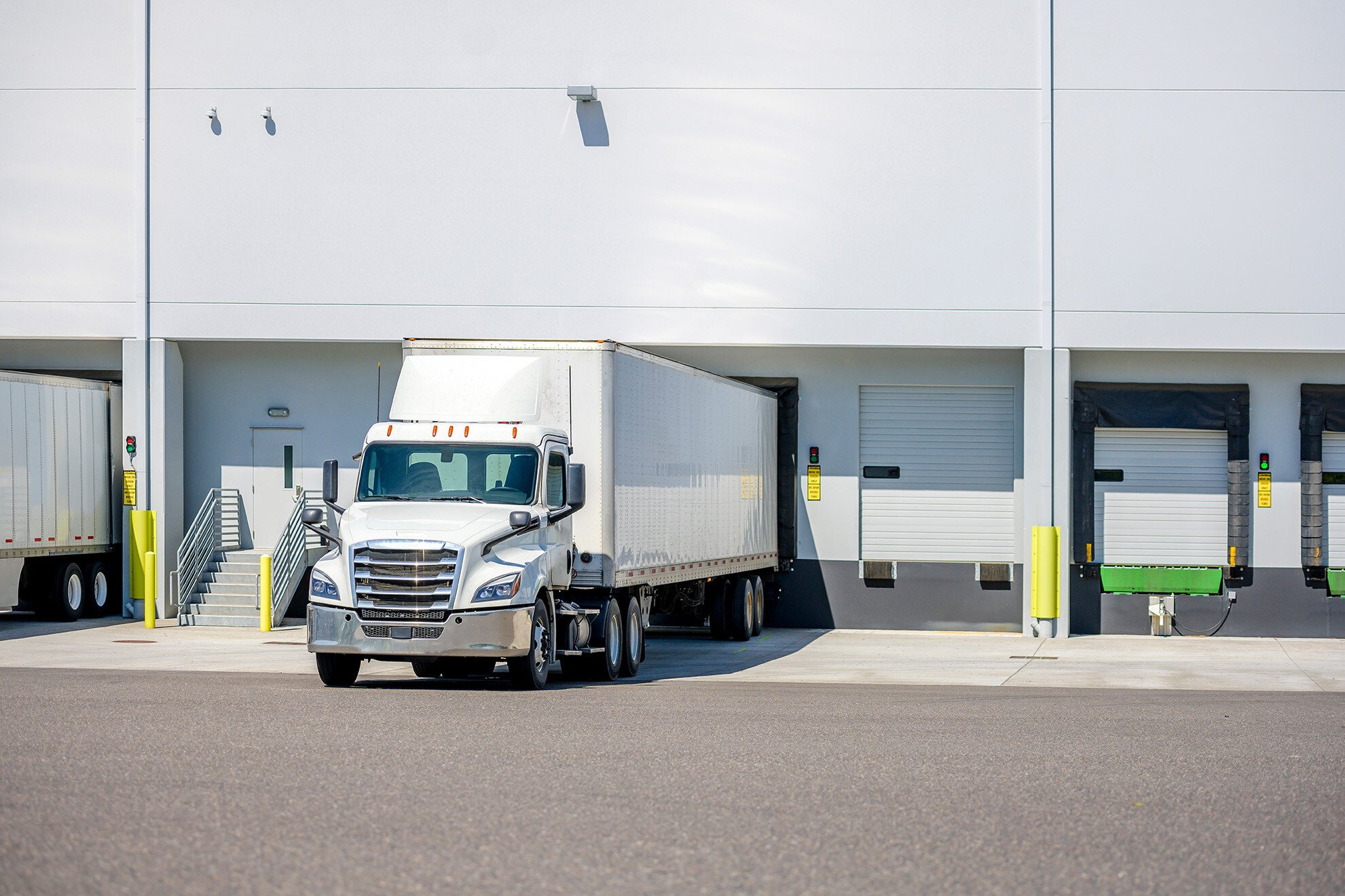 A driver finishes hauling hot shot loads to a warehouse